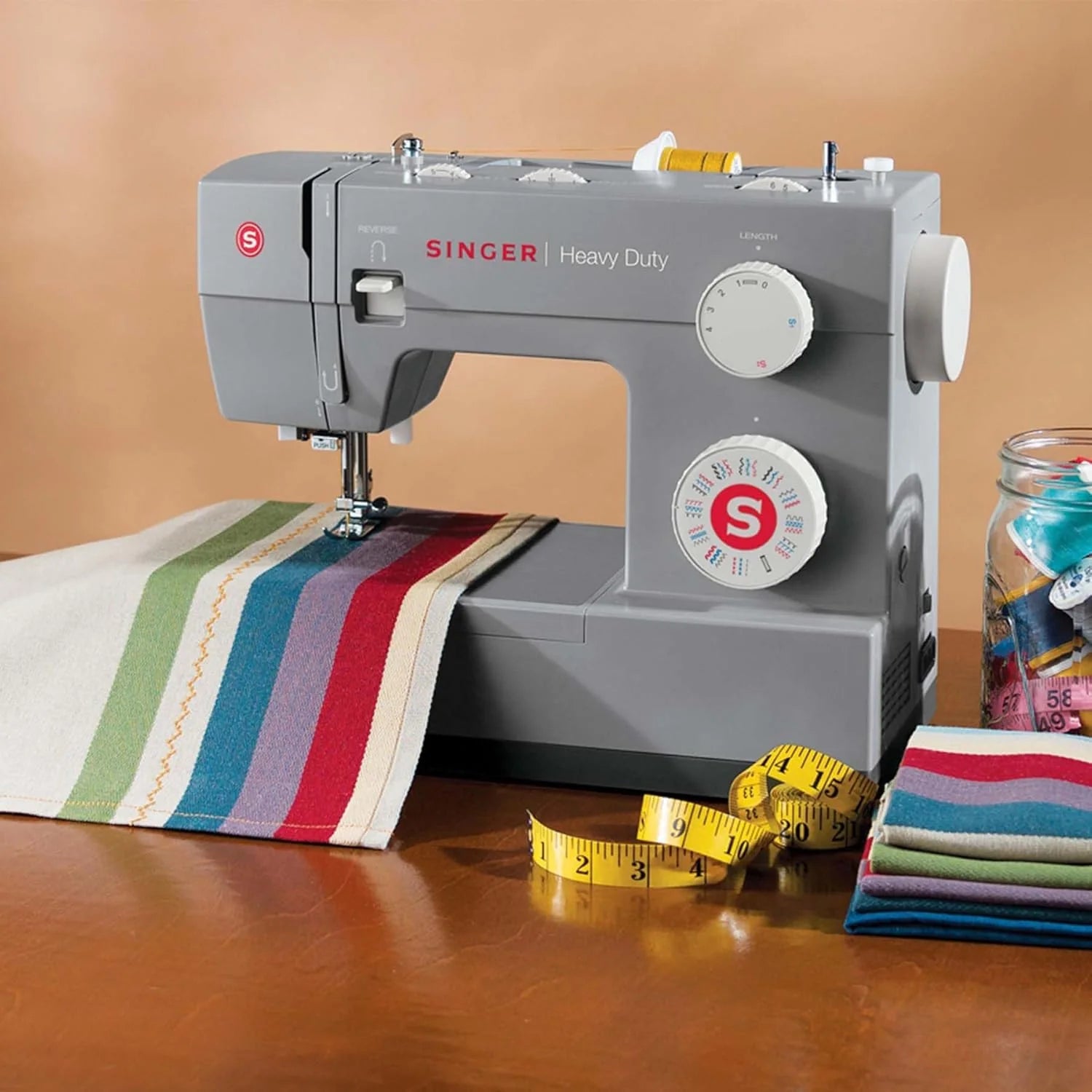 SINGER Heavy Duty 4423 High Speed Sewing Machine with Accessory Kit | Strong Motor With Enhanced Piercing Power, 97 Stitch Applications, Full Metal frame, 1-step Buttonhole & LED Light